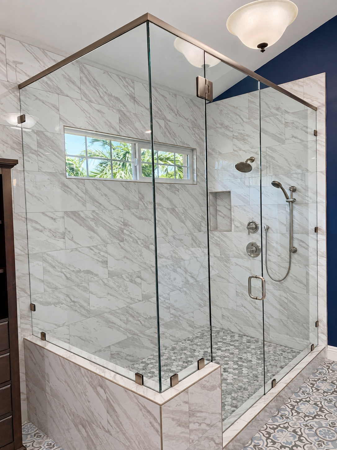 Custom 90 degree frameless shower enclosure in a Kauai bathroom